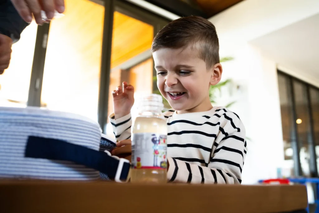 Kid drinking mini eastcoast juice