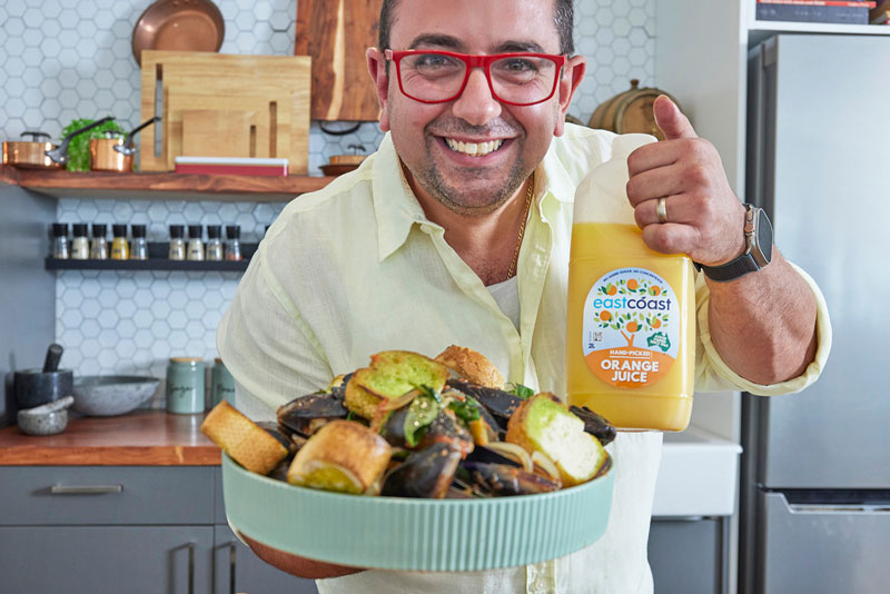 Chef Daniel holding Tomato Basil Mussels